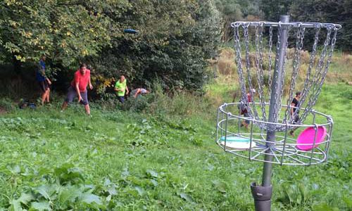 discogolfen Bewegen in het groen